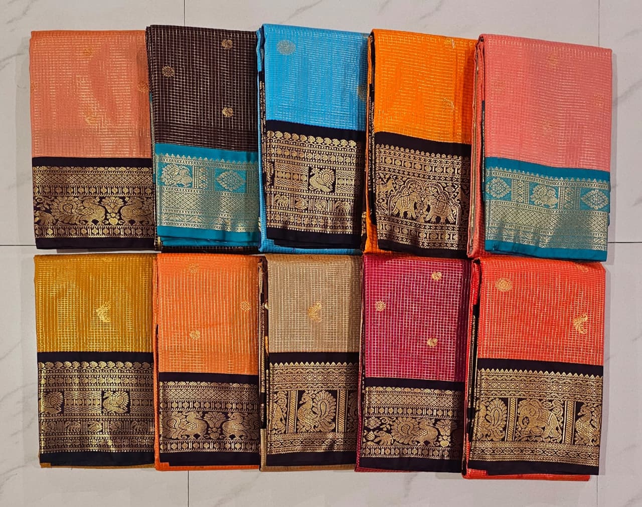 premium quality and elegant checked strips silk sarees